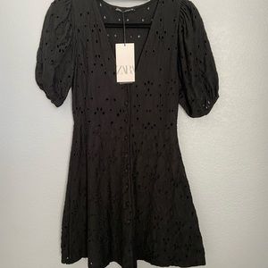 Black eyelet puff sleeve dress